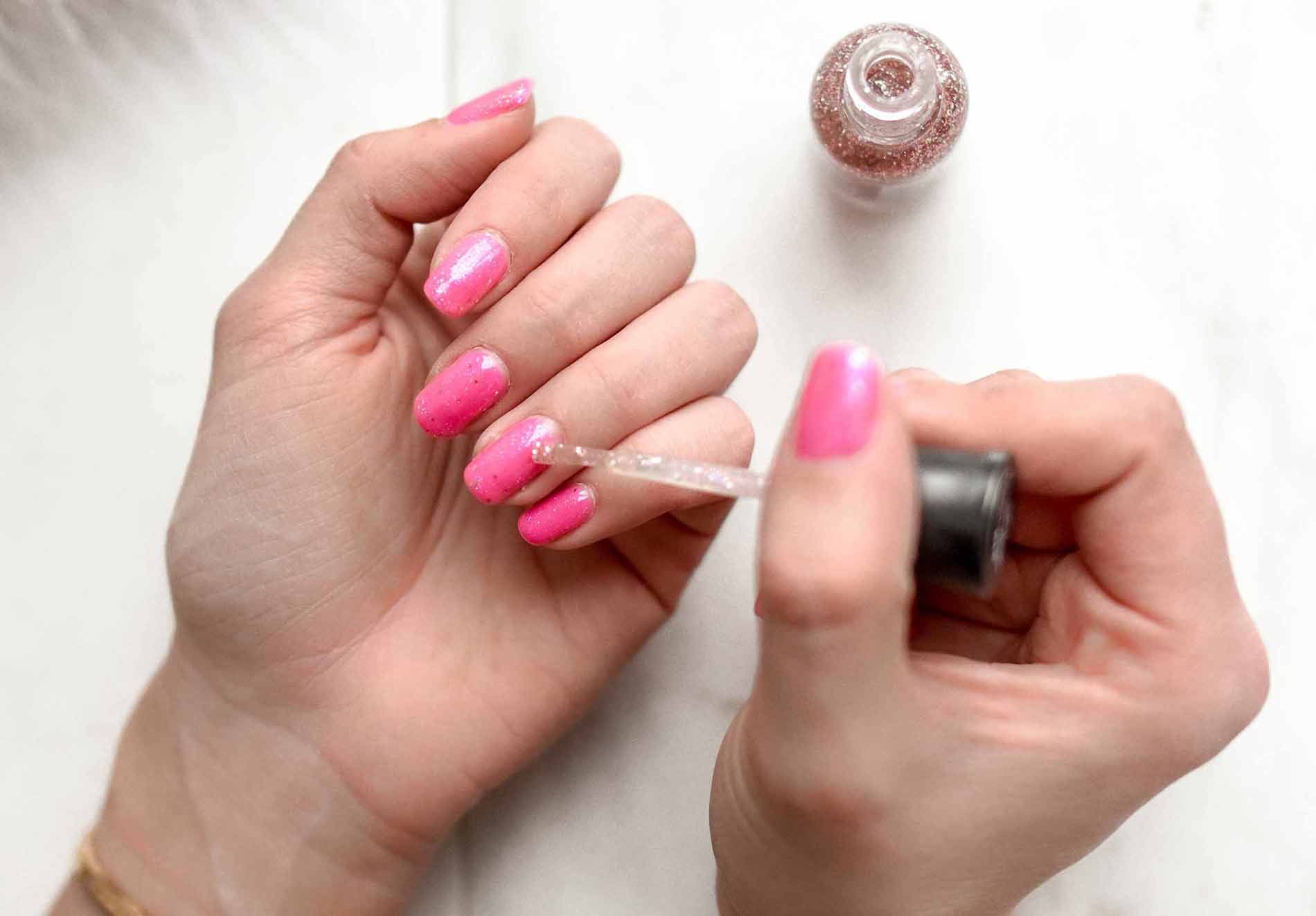 Woman Painting Her Nails